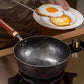 Handgemaakte gehamerde gietijzeren wok zonder coating met deksel